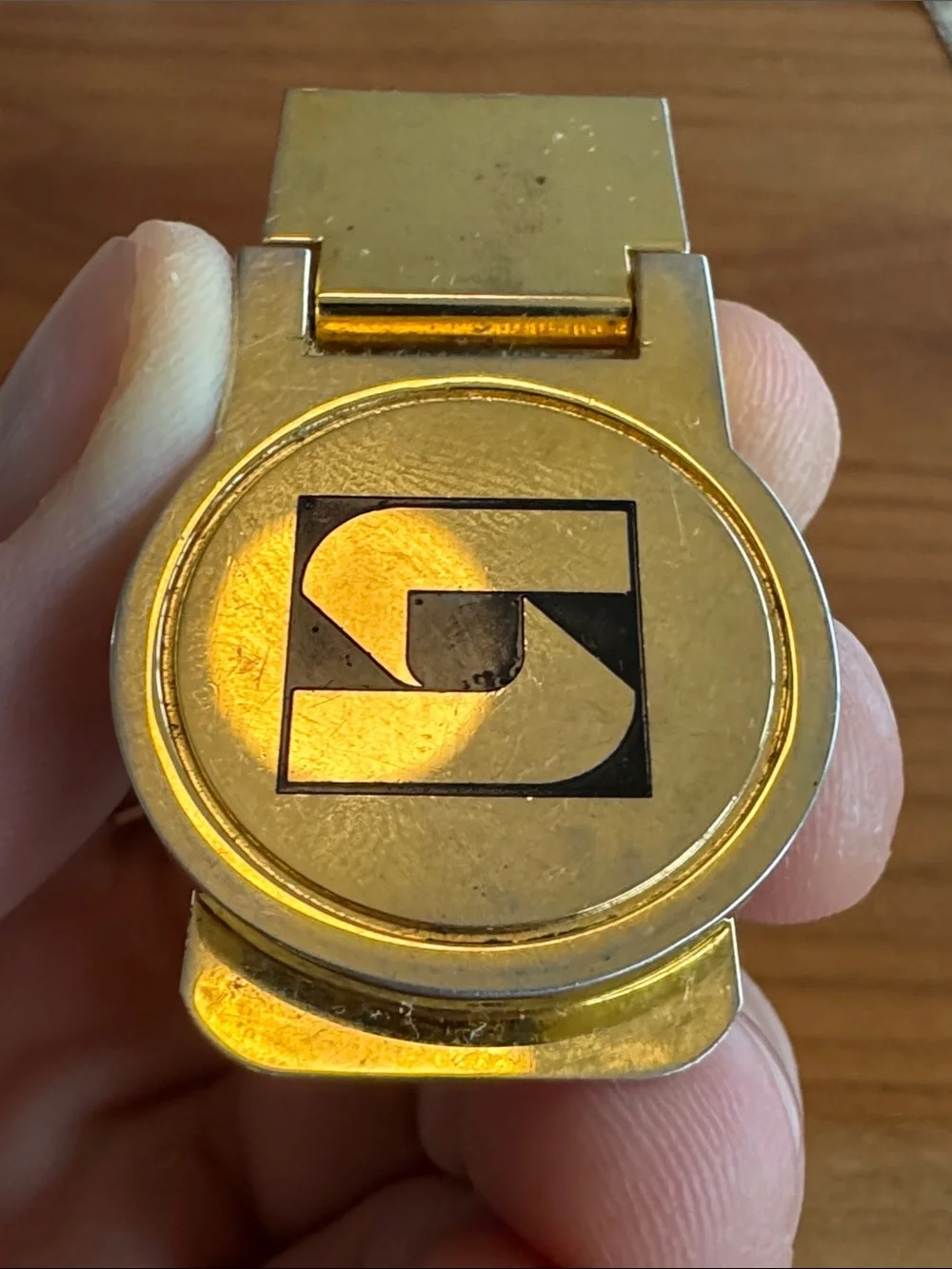 Vintage Gold-tone Money Clip with Abstract Black Logo